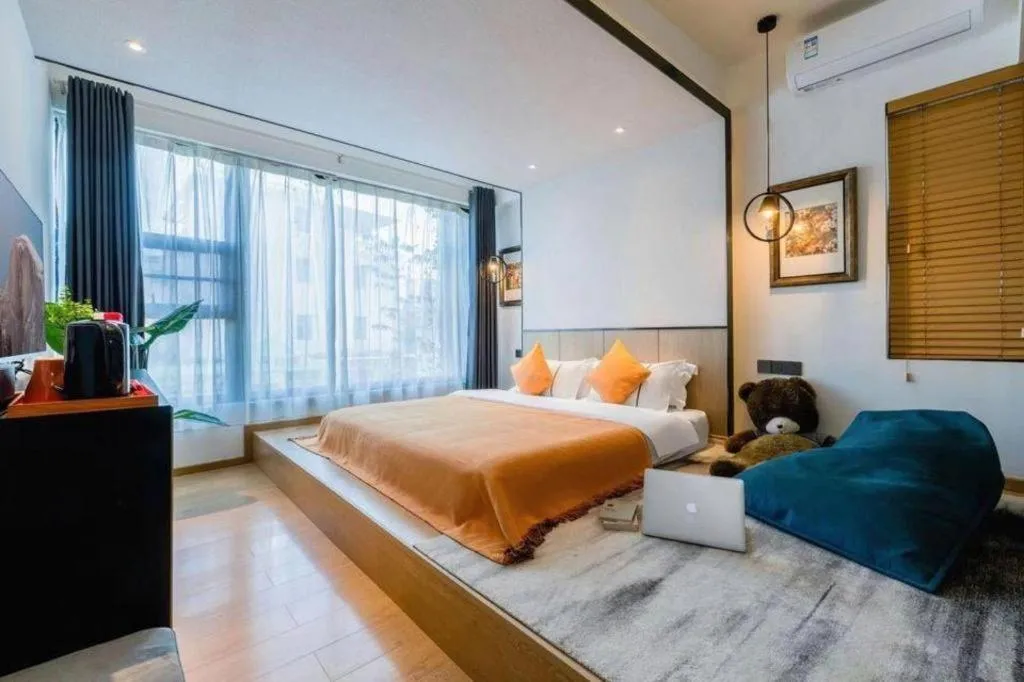 Bed in BOOK PAVILION HOTEL