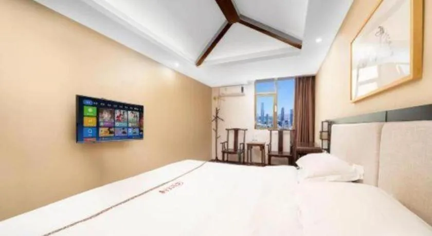 Bed in BOOK PAVILION HOTEL