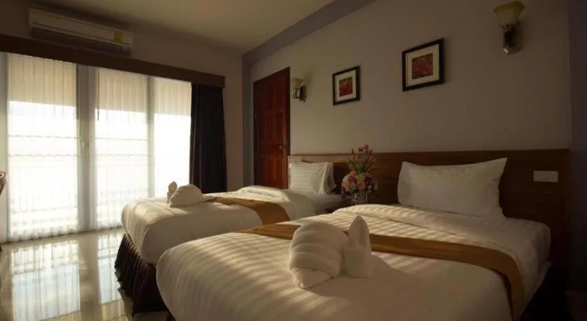 Bed in Royal Hill Satun Hotel