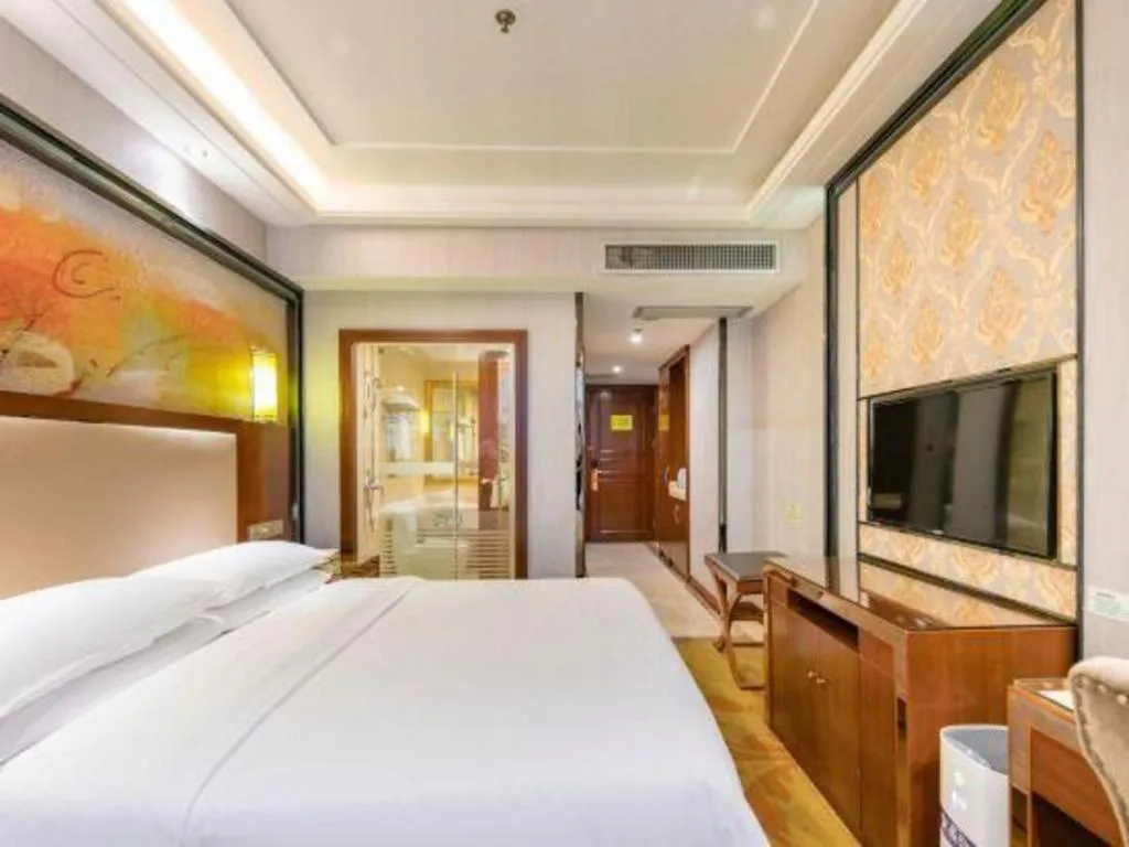 Bed in Vienna International Hotel Nanning Railway Station Mingxiu Road Metro Station