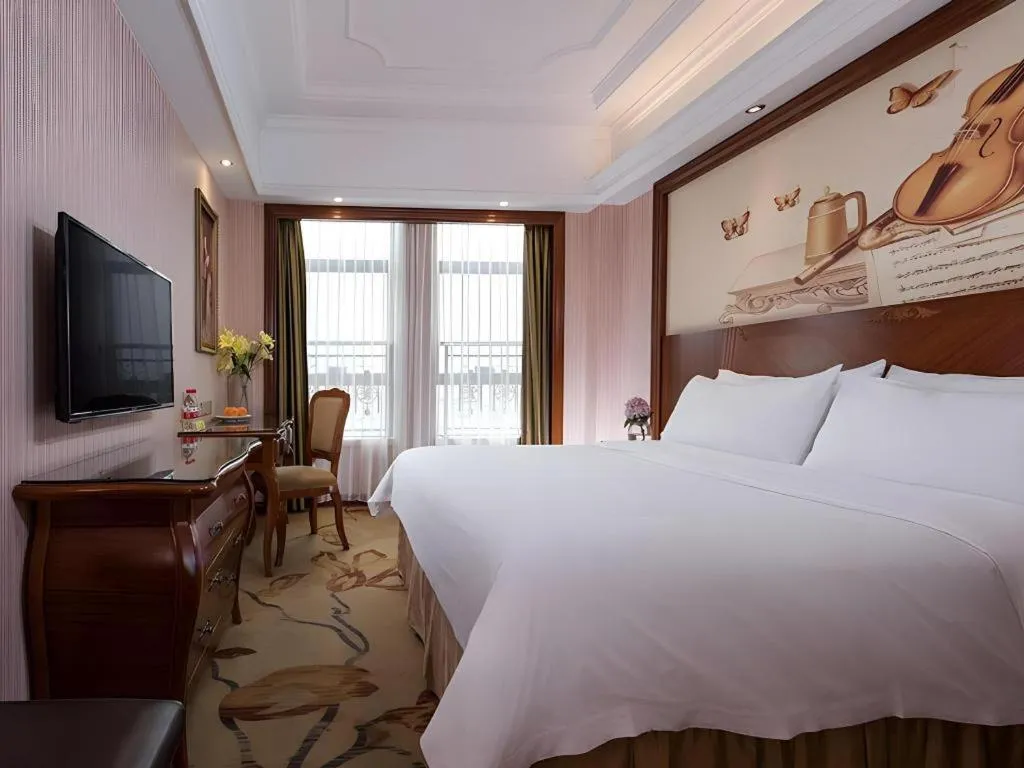 Bed in Vienna International Hotel Nanning Railway Station Mingxiu Road Metro Station