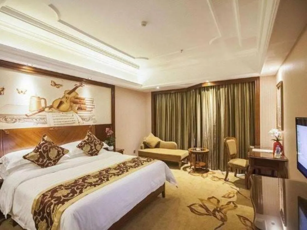 Bed in Vienna International Hotel Nanning Railway Station Mingxiu Road Metro Station