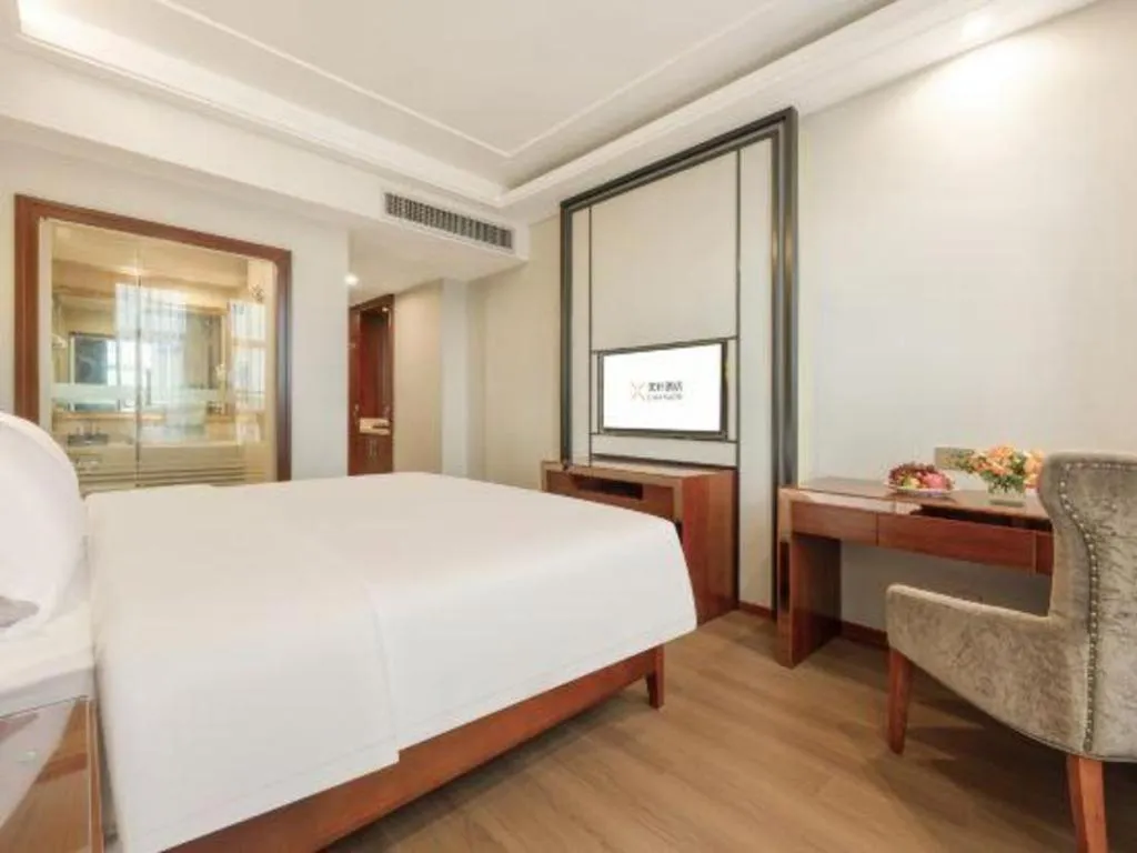 Bed in Vienna International Hotel Nanning Railway Station Mingxiu Road Metro Station