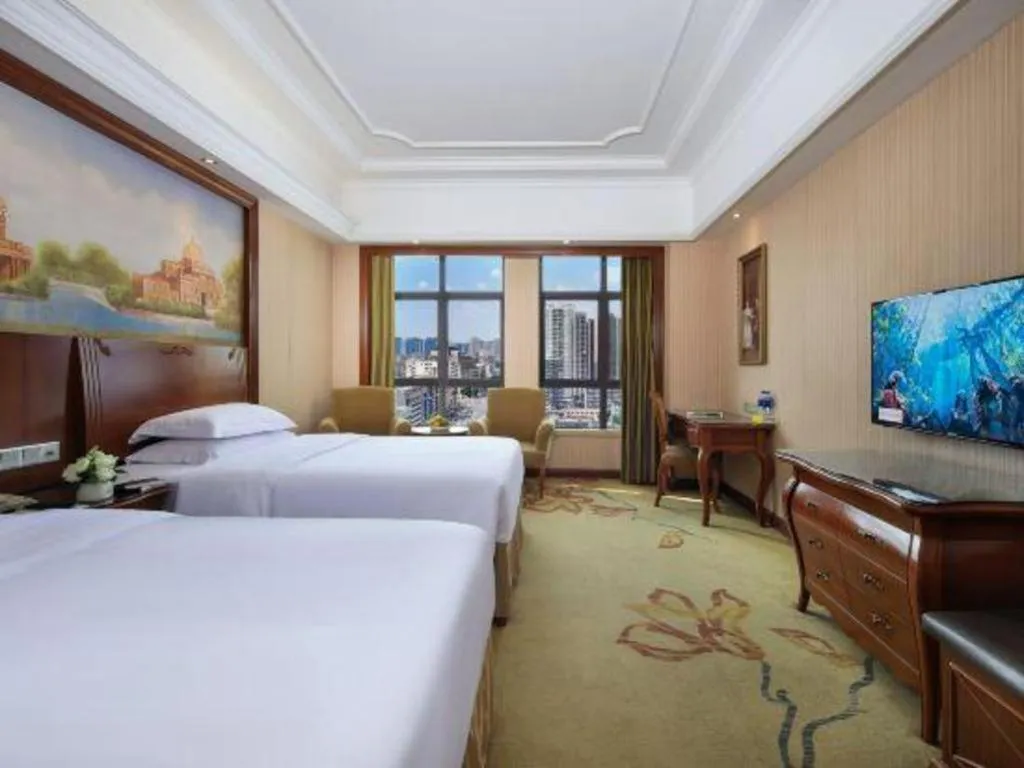 Bed in Vienna International Hotel Nanning Railway Station Mingxiu Road Metro Station