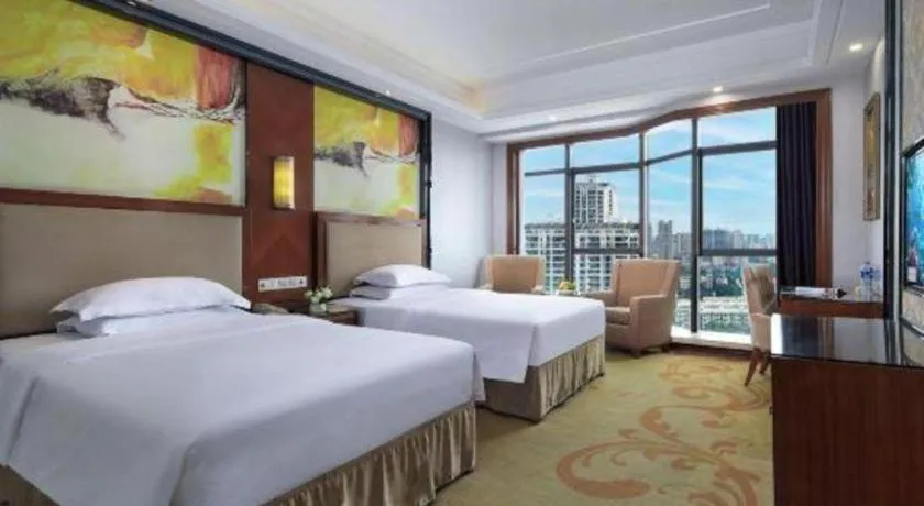 Bed in Vienna International Hotel Nanning Railway Station Mingxiu Road Metro Station