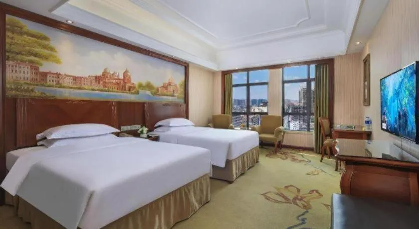 Bed in Vienna International Hotel Nanning Railway Station Mingxiu Road Metro Station