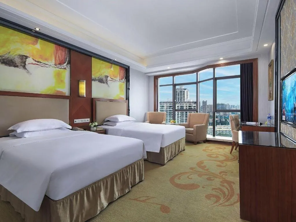 Bed in Vienna International Hotel Nanning Railway Station Mingxiu Road Metro Station