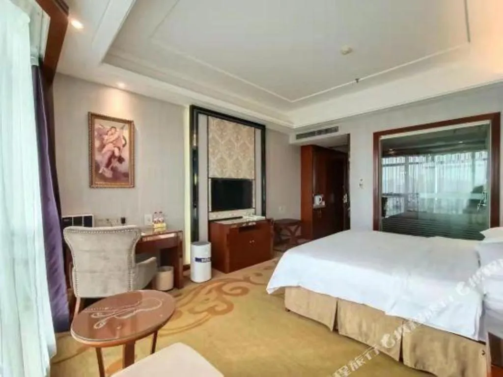 Bed in Vienna International Hotel Nanning Railway Station Mingxiu Road Metro Station