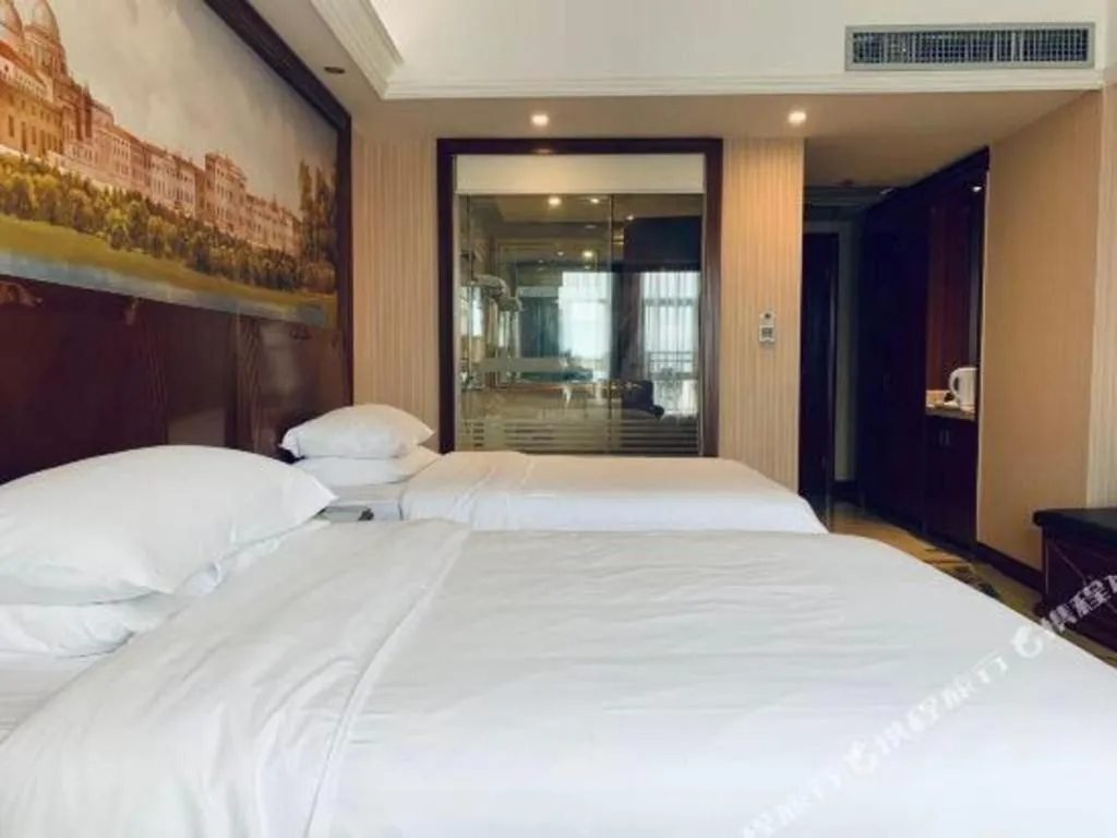 Bed in Vienna International Hotel Nanning Railway Station Mingxiu Road Metro Station