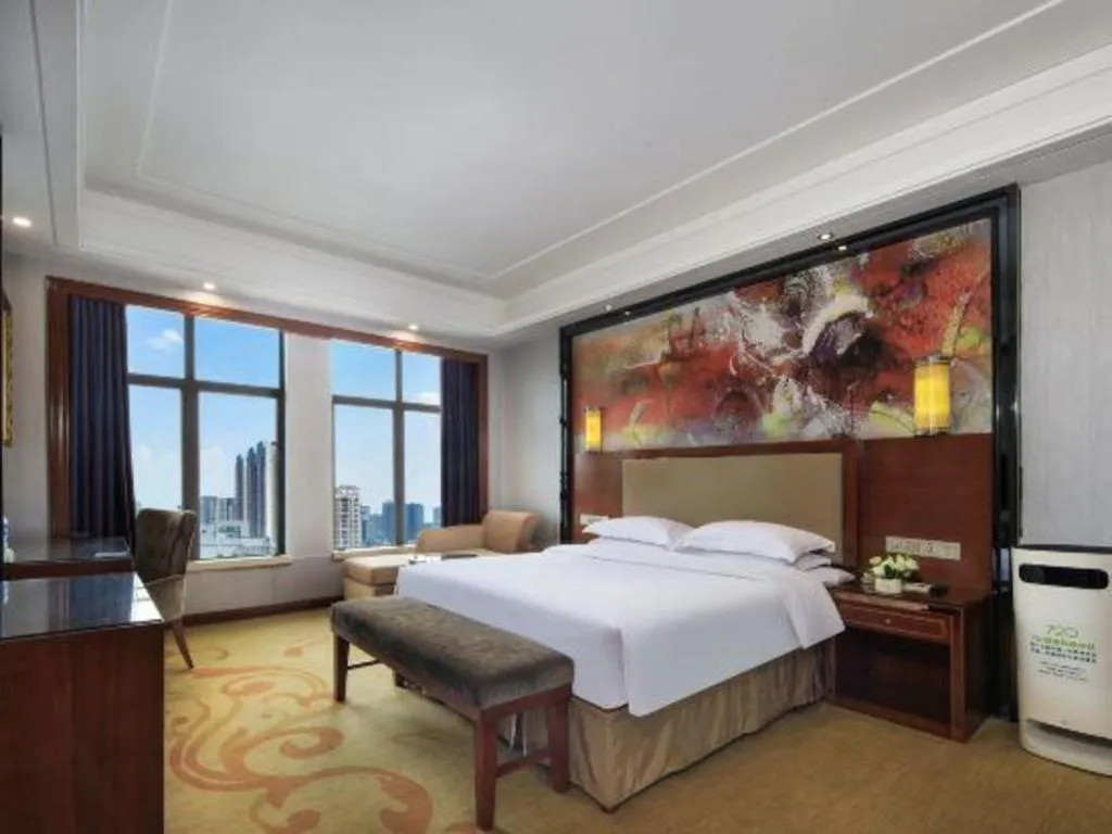 Bed in Vienna International Hotel Nanning Railway Station Mingxiu Road Metro Station