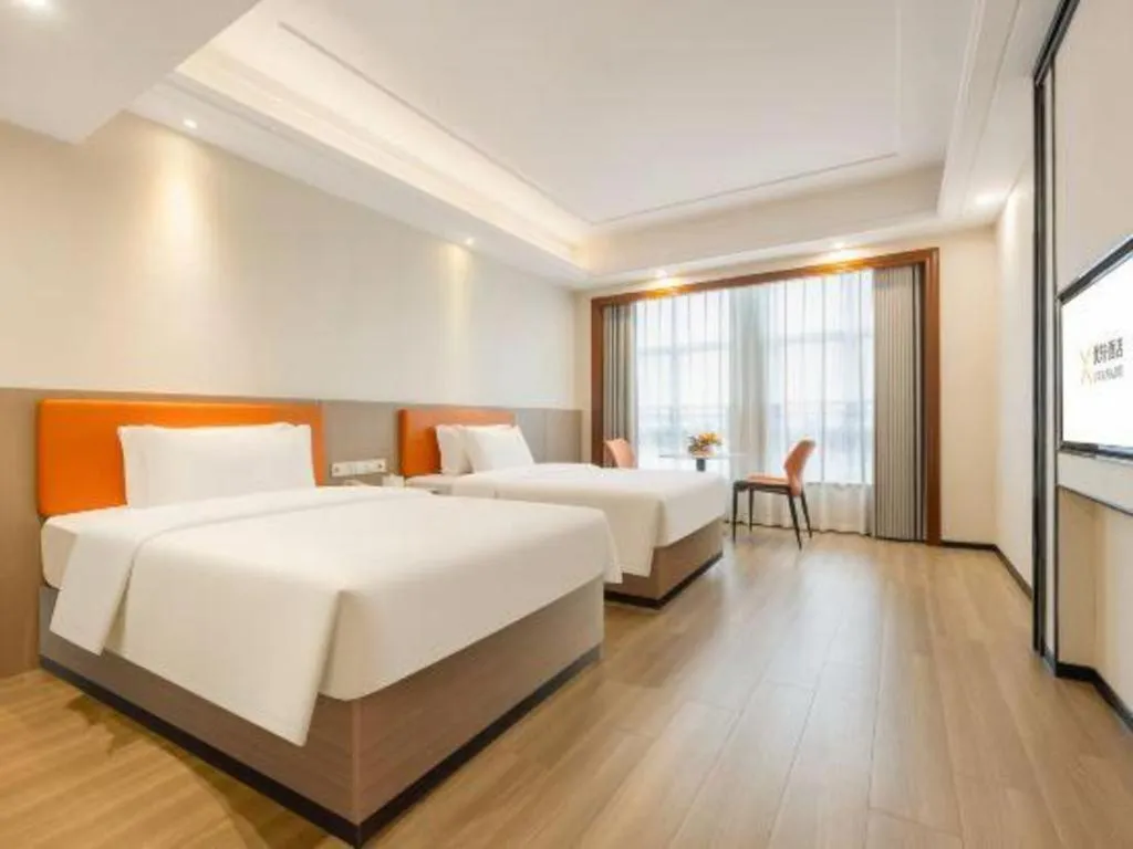 Bed in Vienna International Hotel Nanning Railway Station Mingxiu Road Metro Station