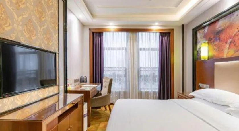 Bed in Vienna International Hotel Nanning Railway Station Mingxiu Road Metro Station