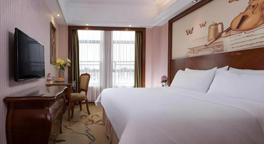 Bed in Vienna International Hotel Nanning Railway Station Mingxiu Road Metro Station