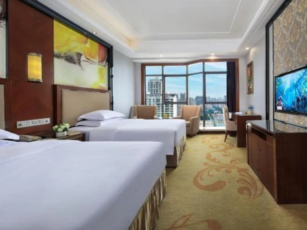 Bed in Vienna International Hotel Nanning Railway Station Mingxiu Road Metro Station