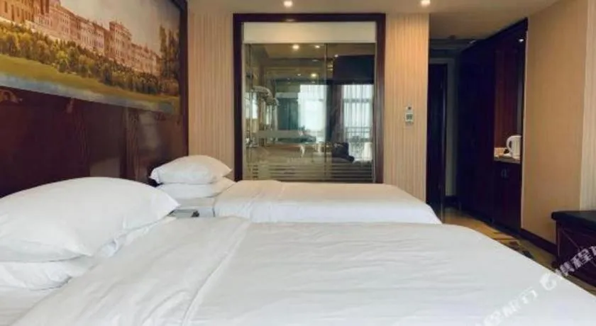 Bed in Vienna International Hotel Nanning Railway Station Mingxiu Road Metro Station