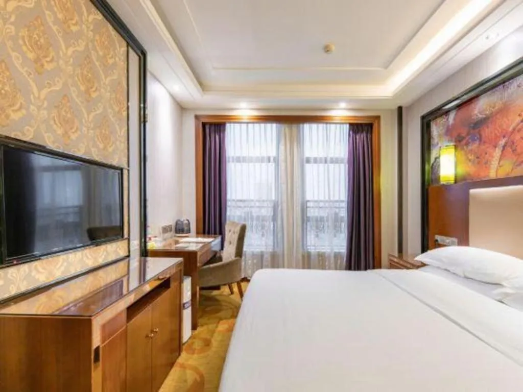 Bed in Vienna International Hotel Nanning Railway Station Mingxiu Road Metro Station