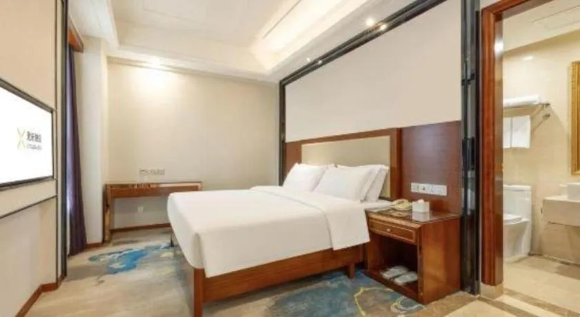 Bed in Vienna International Hotel Nanning Railway Station Mingxiu Road Metro Station
