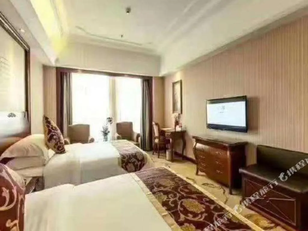 Bed in Vienna International Hotel Nanning Railway Station Mingxiu Road Metro Station