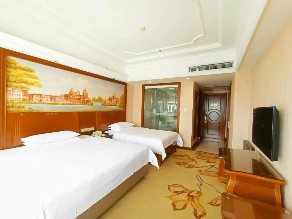 Bed in Vienna International Hotel Nanning Railway Station Mingxiu Road Metro Station