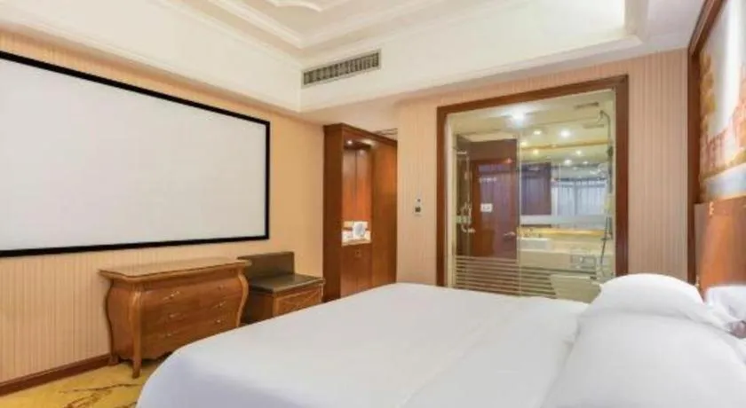 Bed in Vienna International Hotel Nanning Railway Station Mingxiu Road Metro Station