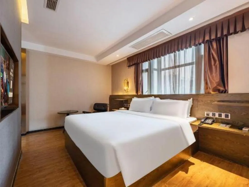 Bed in James Joyce Coffetel Chengdu Jianshe Road Dongjiao Jiyi Square
