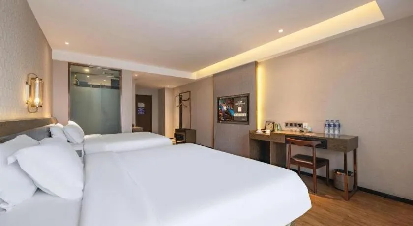 Bed in James Joyce Coffetel Chengdu Jianshe Road Dongjiao Jiyi Square