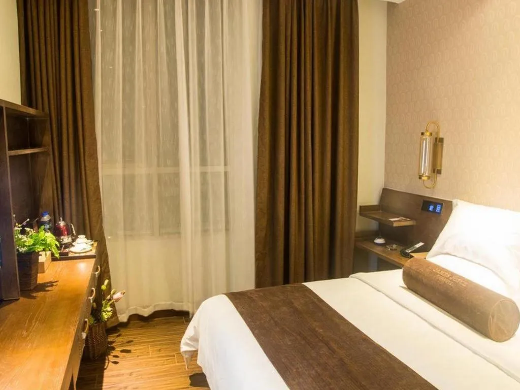 Bed in James Joyce Coffetel Chengdu Jianshe Road Dongjiao Jiyi Square