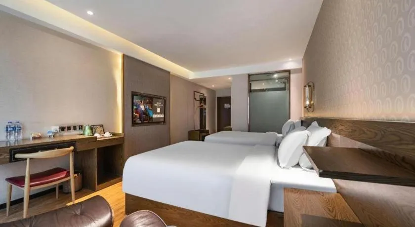 Bed in James Joyce Coffetel Chengdu Jianshe Road Dongjiao Jiyi Square