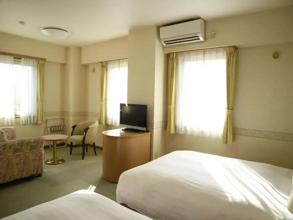 Bed in KEIKYU EX INN Yokosuka Research Park Bed in KEIKYU EX INN Yokosuka Research Park