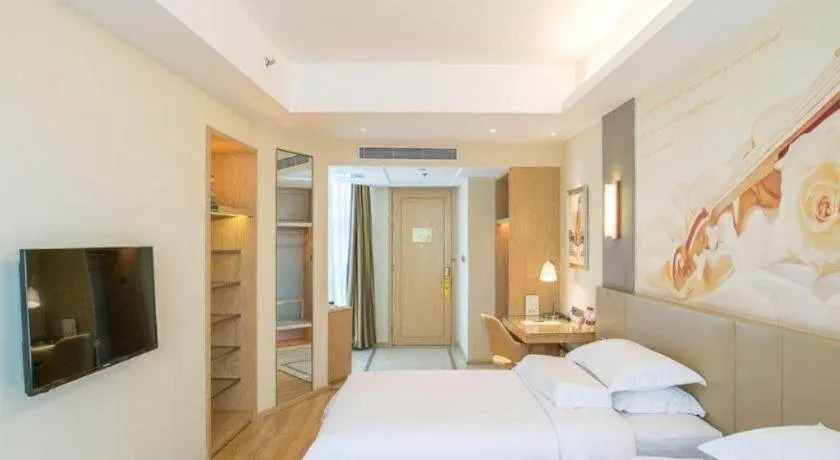 Bed in Vienna International Hotel Chengdu New International Conference and Exhibition Center Branch