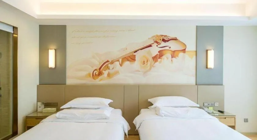 Bed in Vienna International Hotel Chengdu New International Conference and Exhibition Center Branch