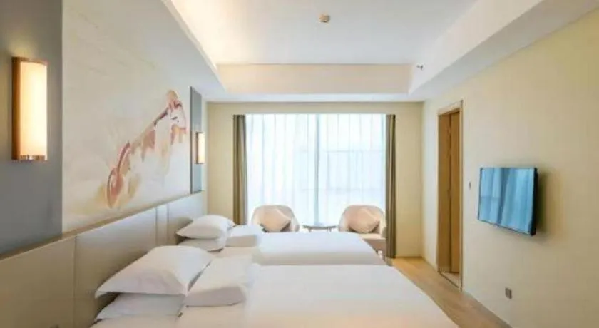 Bed in Vienna International Hotel Chengdu New International Conference and Exhibition Center Branch