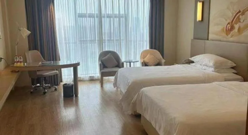 Bed in Vienna International Hotel Chengdu New International Conference and Exhibition Center Branch