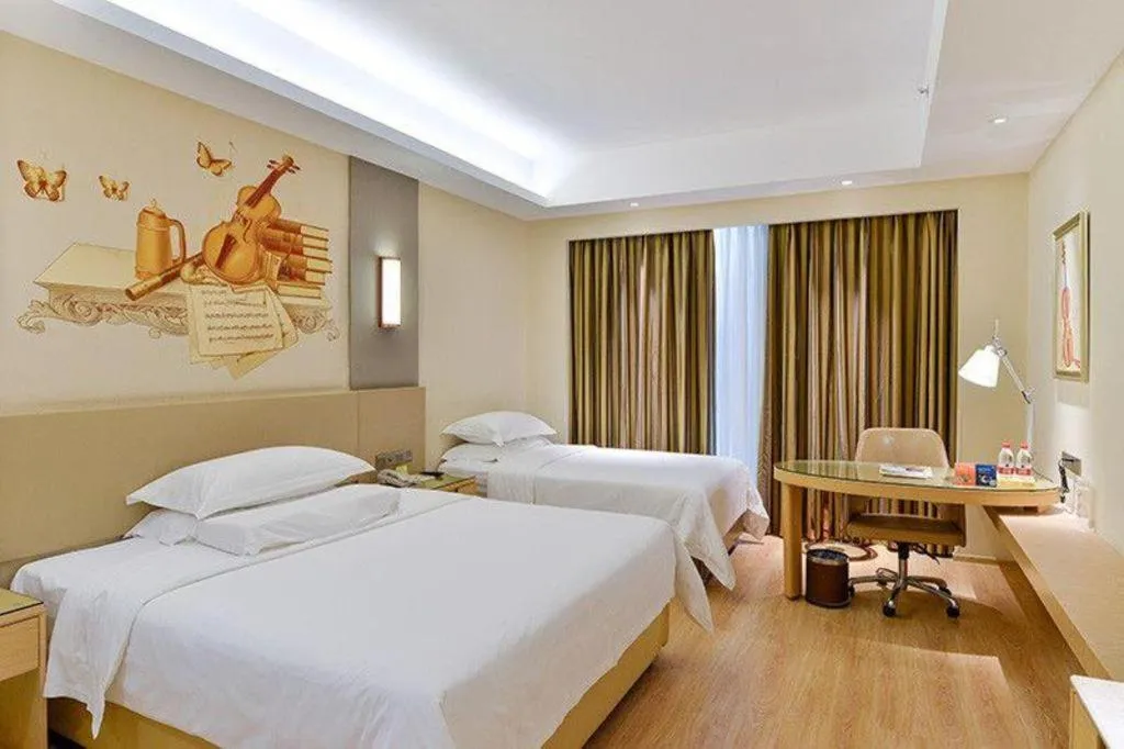 Bed in Vienna International Hotel Chengdu New International Conference and Exhibition Center Branch
