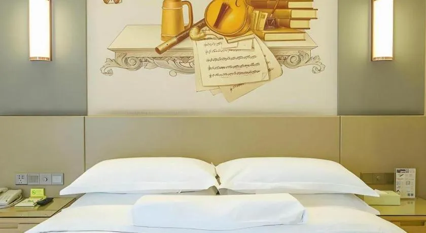 Bed in Vienna International Hotel Chengdu New International Conference and Exhibition Center Branch