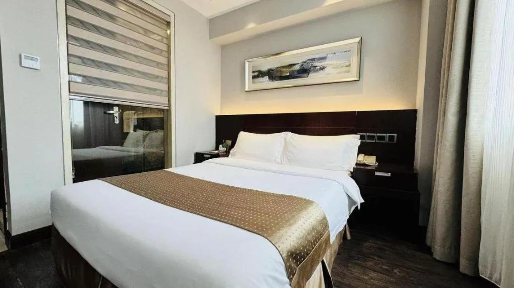 Bed in Maixinge Boutique Hotel Waigaoqiao Free Trade Zone