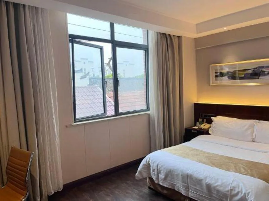 Bed in Maixinge Boutique Hotel Waigaoqiao Free Trade Zone