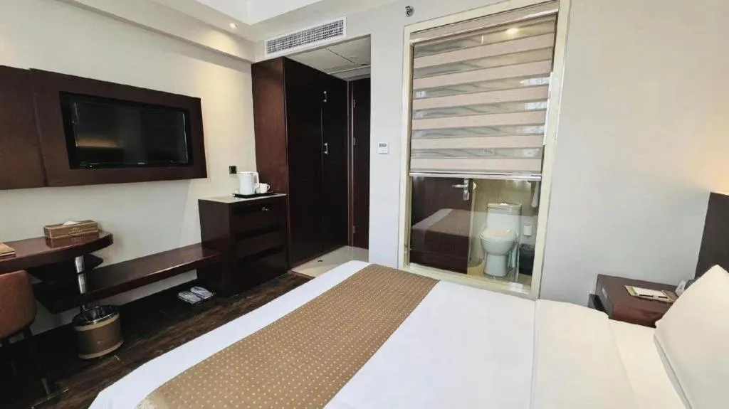 Bed in Maixinge Boutique Hotel Waigaoqiao Free Trade Zone