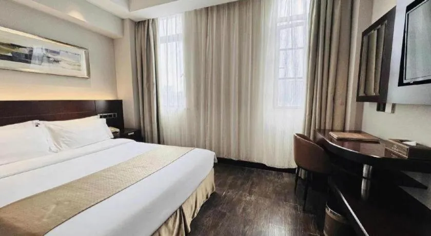 Bed in Maixinge Boutique Hotel Waigaoqiao Free Trade Zone