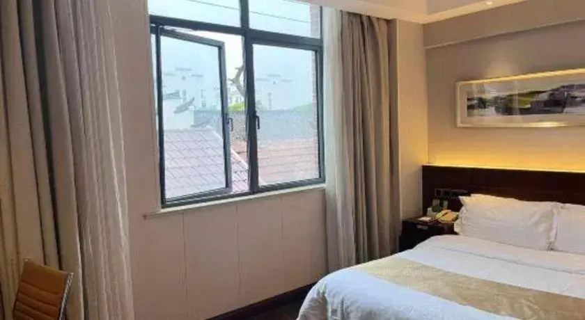 Bed in Maixinge Boutique Hotel Waigaoqiao Free Trade Zone Bed in Maixinge Boutique Hotel Waigaoqiao Free Trade Zone