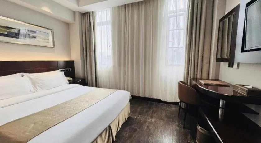 Bed in Maixinge Boutique Hotel Waigaoqiao Free Trade Zone