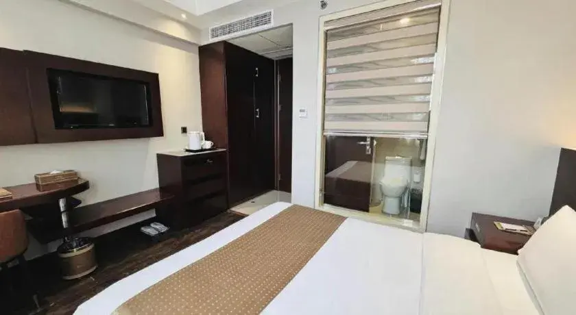 Bed in Maixinge Boutique Hotel Waigaoqiao Free Trade Zone Bed in Maixinge Boutique Hotel Waigaoqiao Free Trade Zone