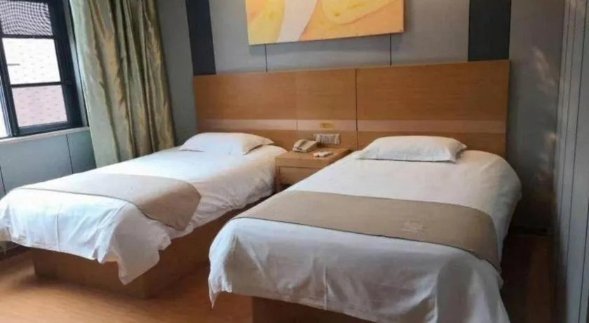Bed in GreenTree Inn Shangrao Qianshan hekou old town Xinjiang longting shell hotel