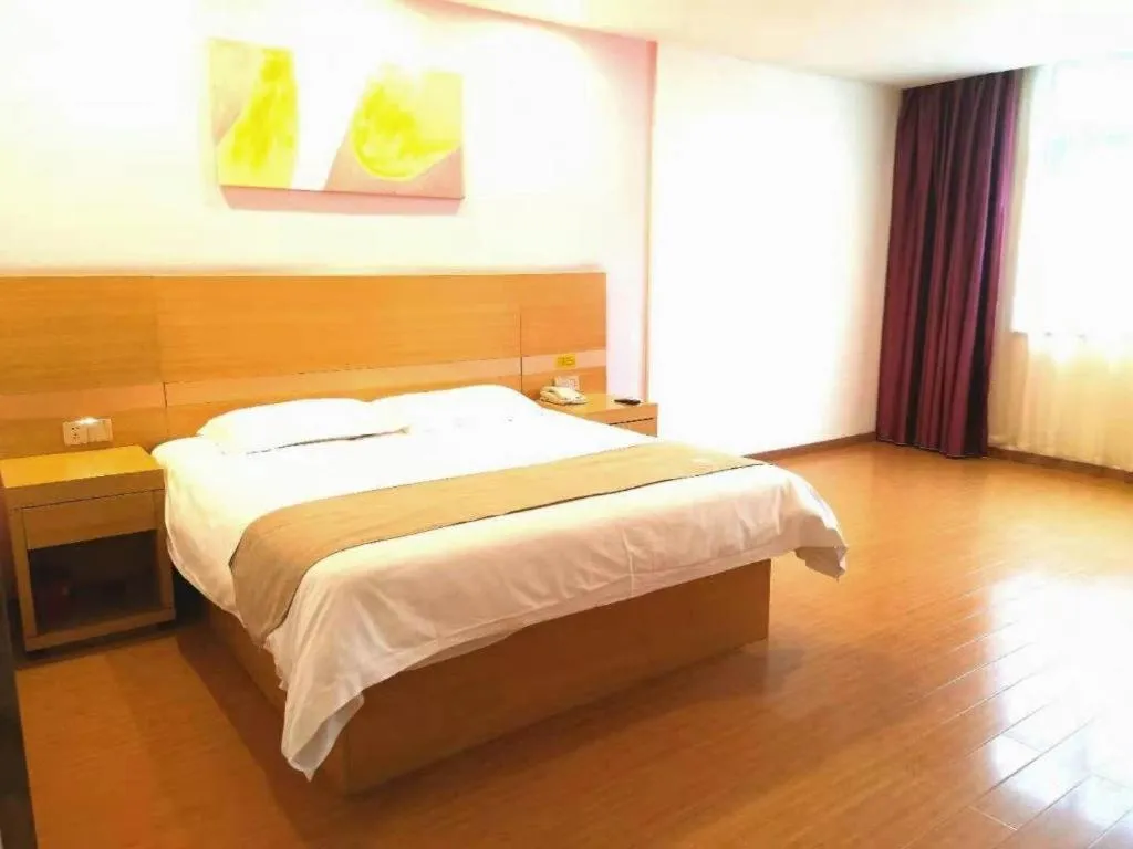 Bed in GreenTree Inn Shangrao Qianshan hekou old town Xinjiang longting shell hotel