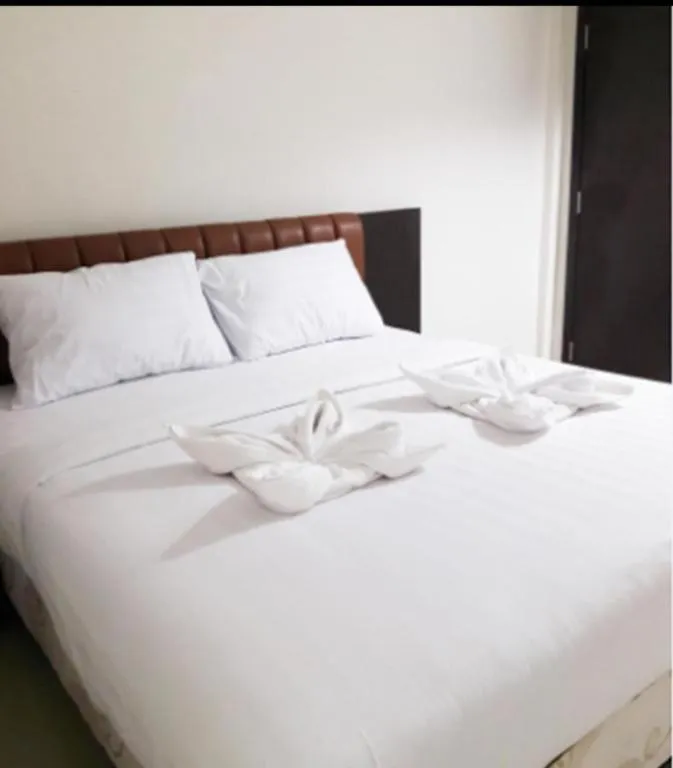 Bed in Karimun City Hotel