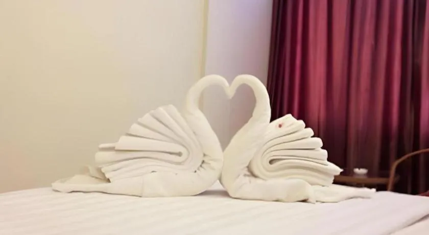 Bed in Karimun City Hotel