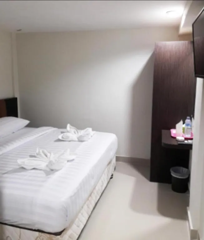 Bed in Karimun City Hotel