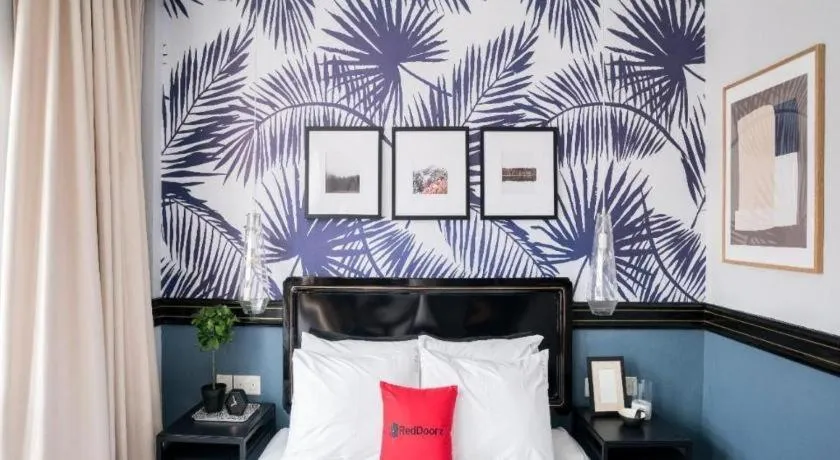 Bed in RedDoorz Hotel near Marine Parade Central