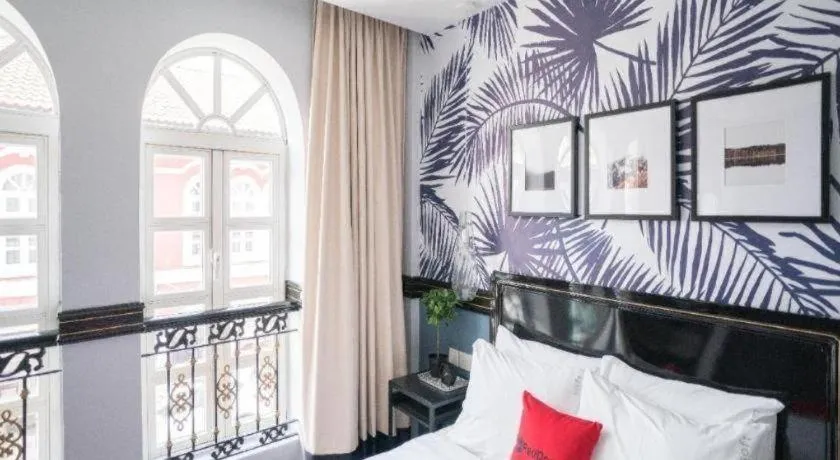 Bed in RedDoorz Hotel near Marine Parade Central