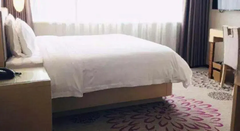 Bed in Lavande Hotel Jinan Quancheng Road Baotu Spring Branch Bed in Lavande Hotel Jinan Quancheng Road Baotu Spring Branch